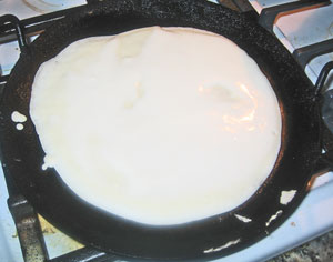 Pancake  Batter just placed on tava